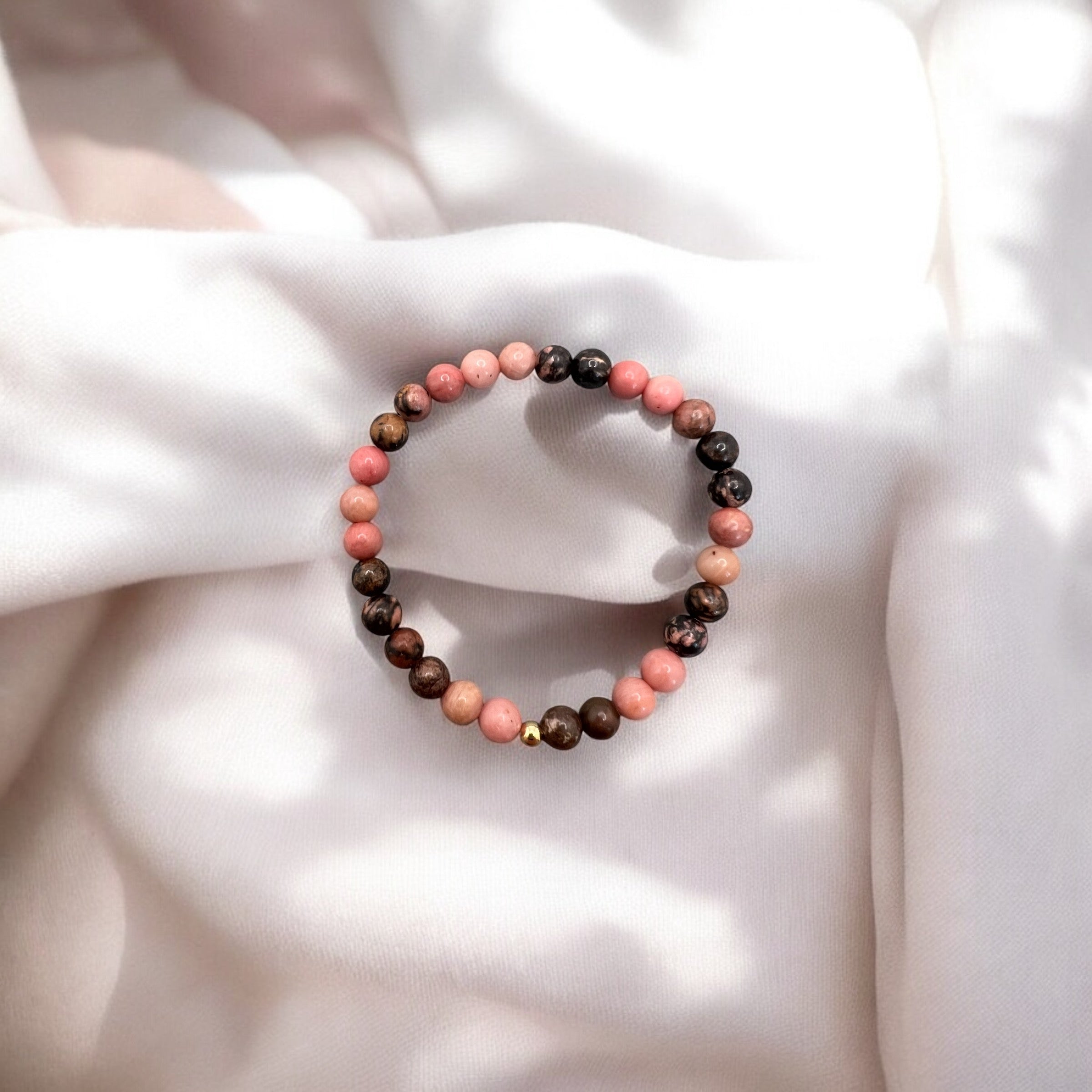 Rhodonit Armband with 6mm round pink and brown beads on elastic band representing love and forgiveness