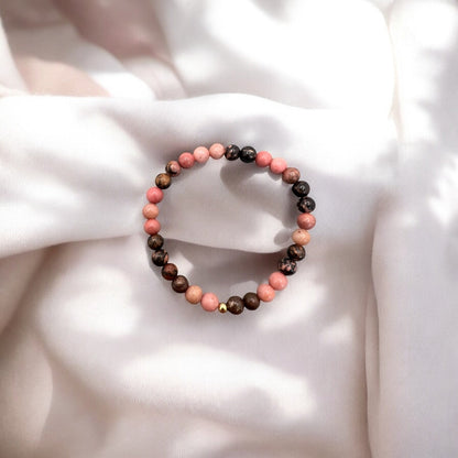 Rhodonit Armband with 6mm round pink and brown beads on elastic band representing love and forgiveness
