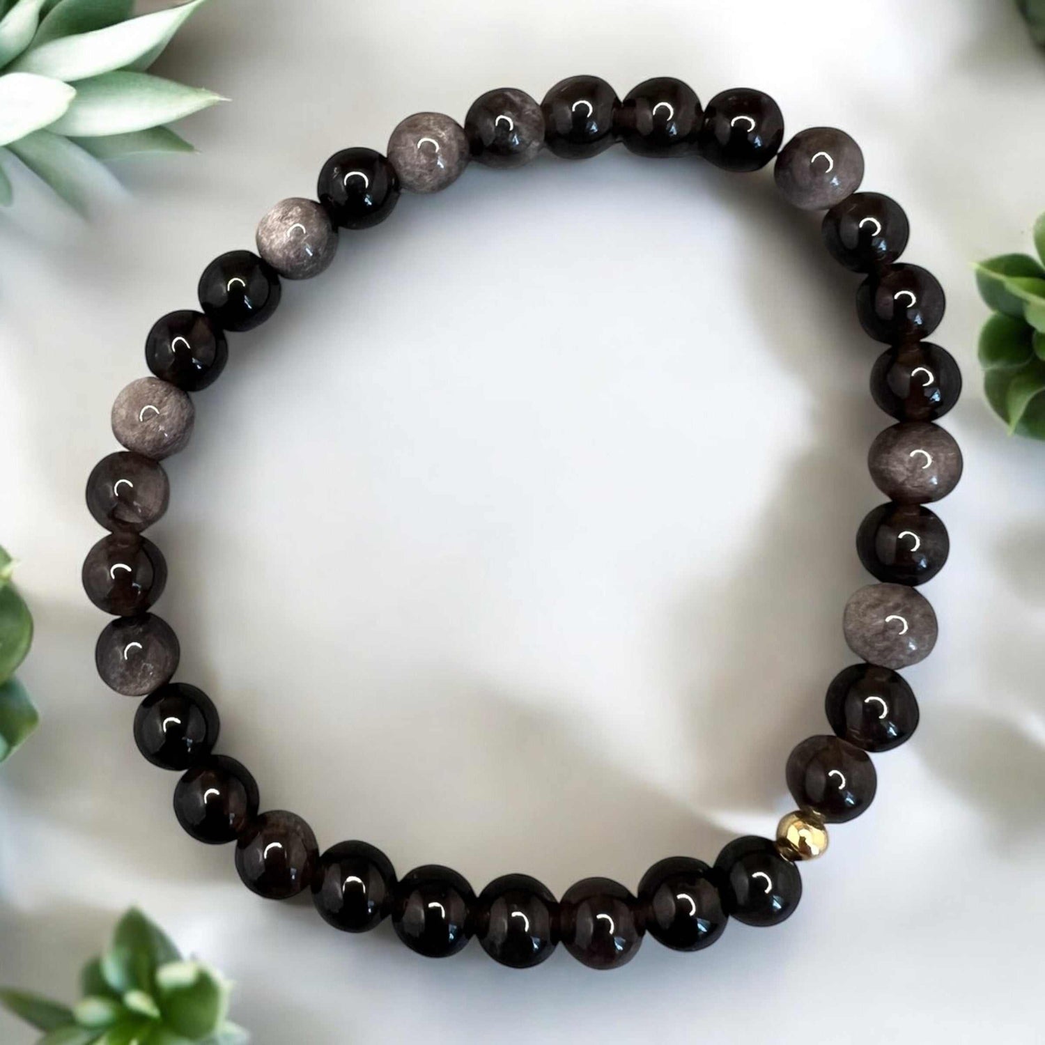 Silberobsidian Armband with 6mm round black and silver infused beads, elastic and handcrafted for protection and emotional clarity