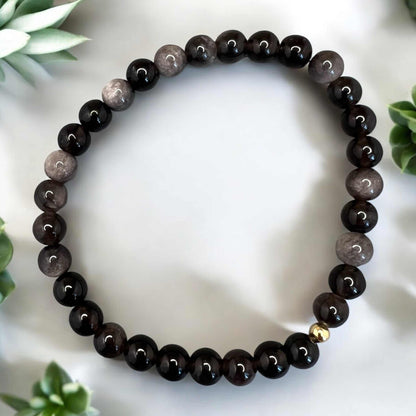 Silberobsidian Armband with 6mm round black and silver infused beads, elastic and handcrafted for protection and emotional clarity
