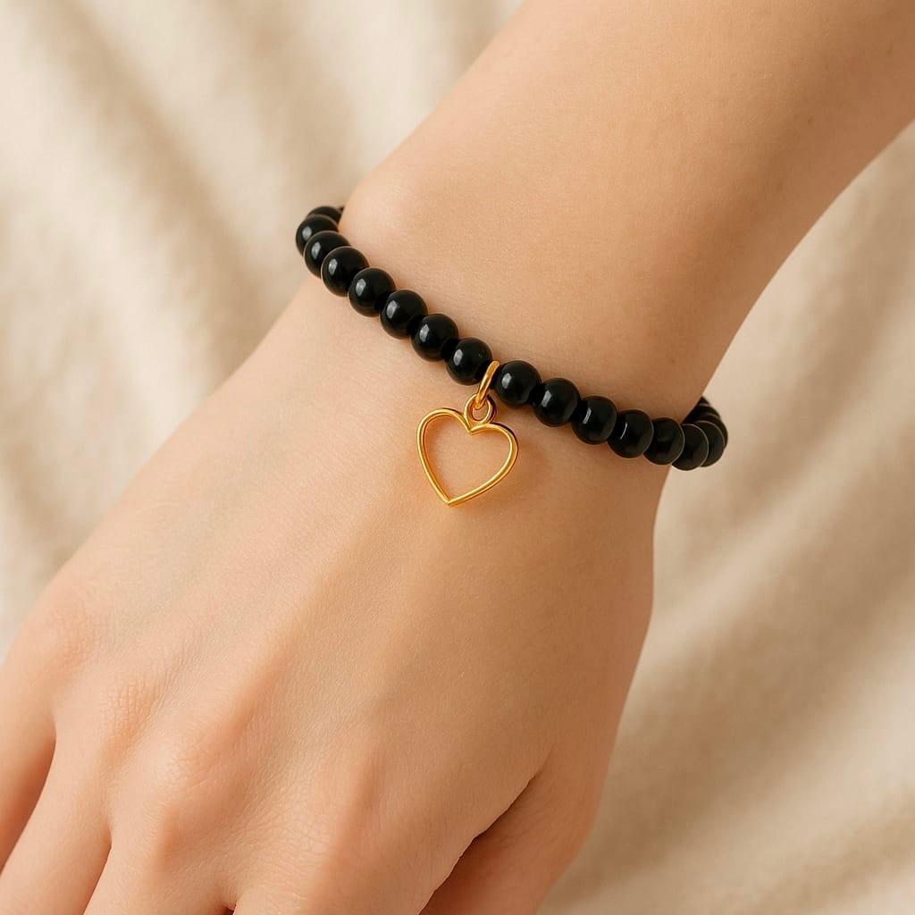 Onyx Armband mit Herzanhänger - Stärke &amp; Schutz